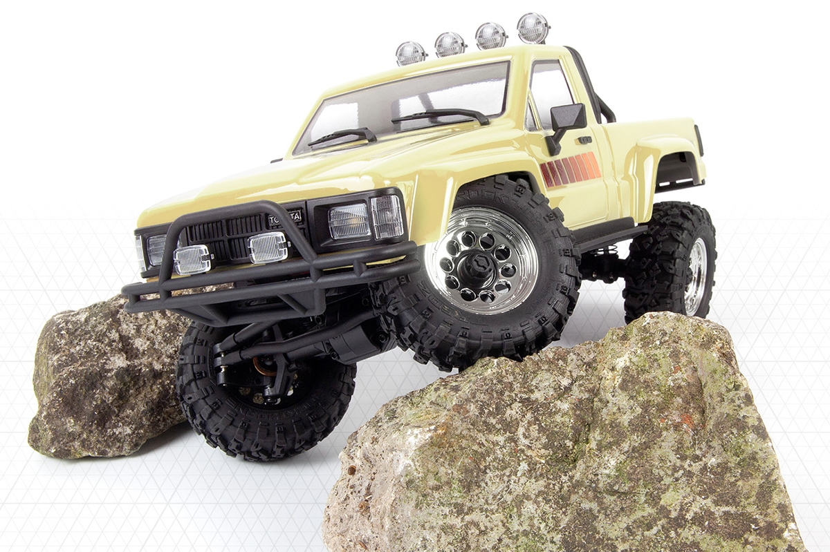 Venture18 Flux 1985 Toyota Hilux SR5 - krémový