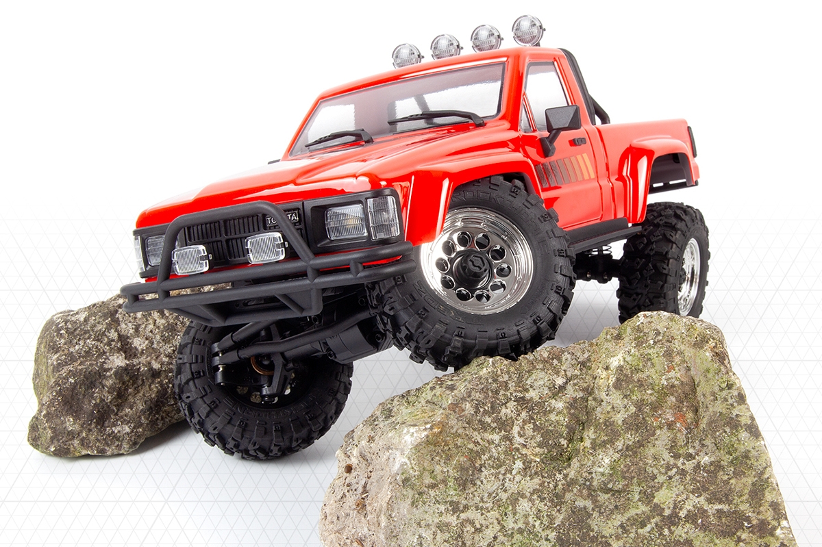 Venture18 Flux 1985 Toyota Hilux SR5 - červený